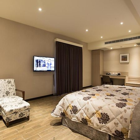Verygood Business Hotel Huatan Oda fotoğraf