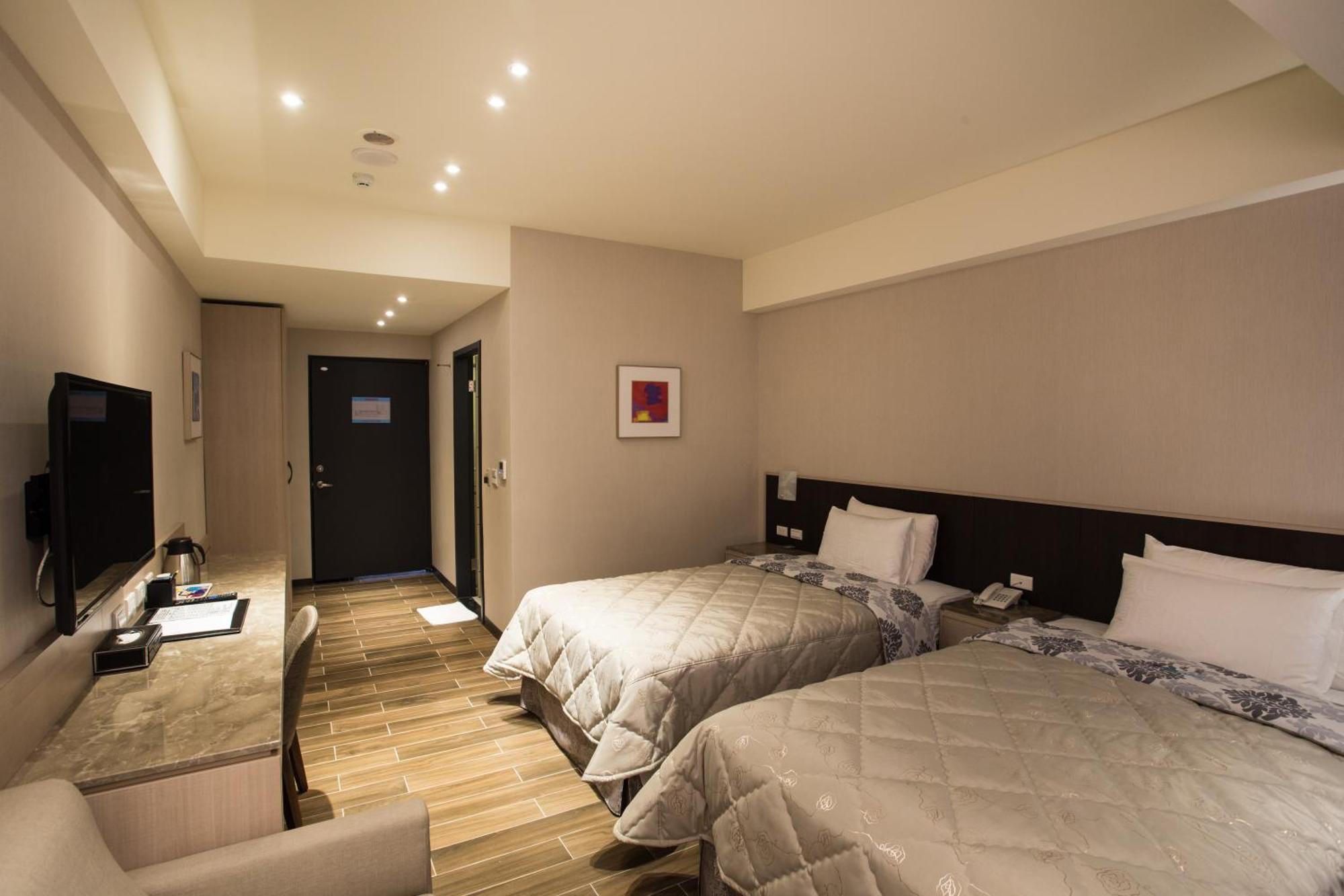 Verygood Business Hotel Huatan Oda fotoğraf